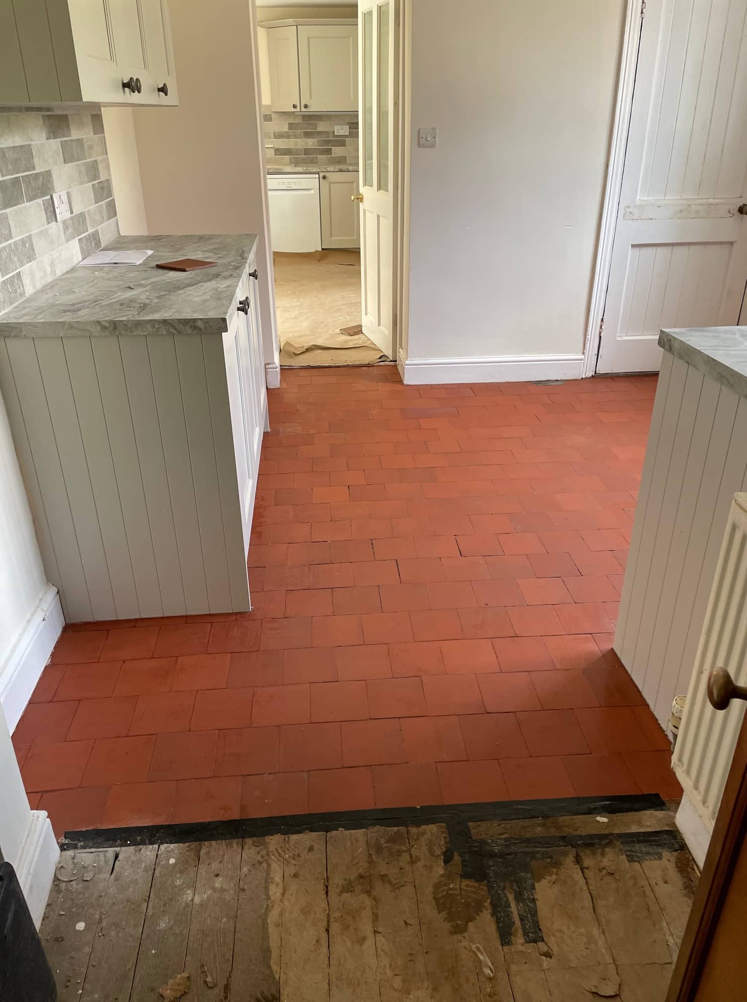 Old Victorian Period Red 6 inch floor tiles after cleaning in Windermere