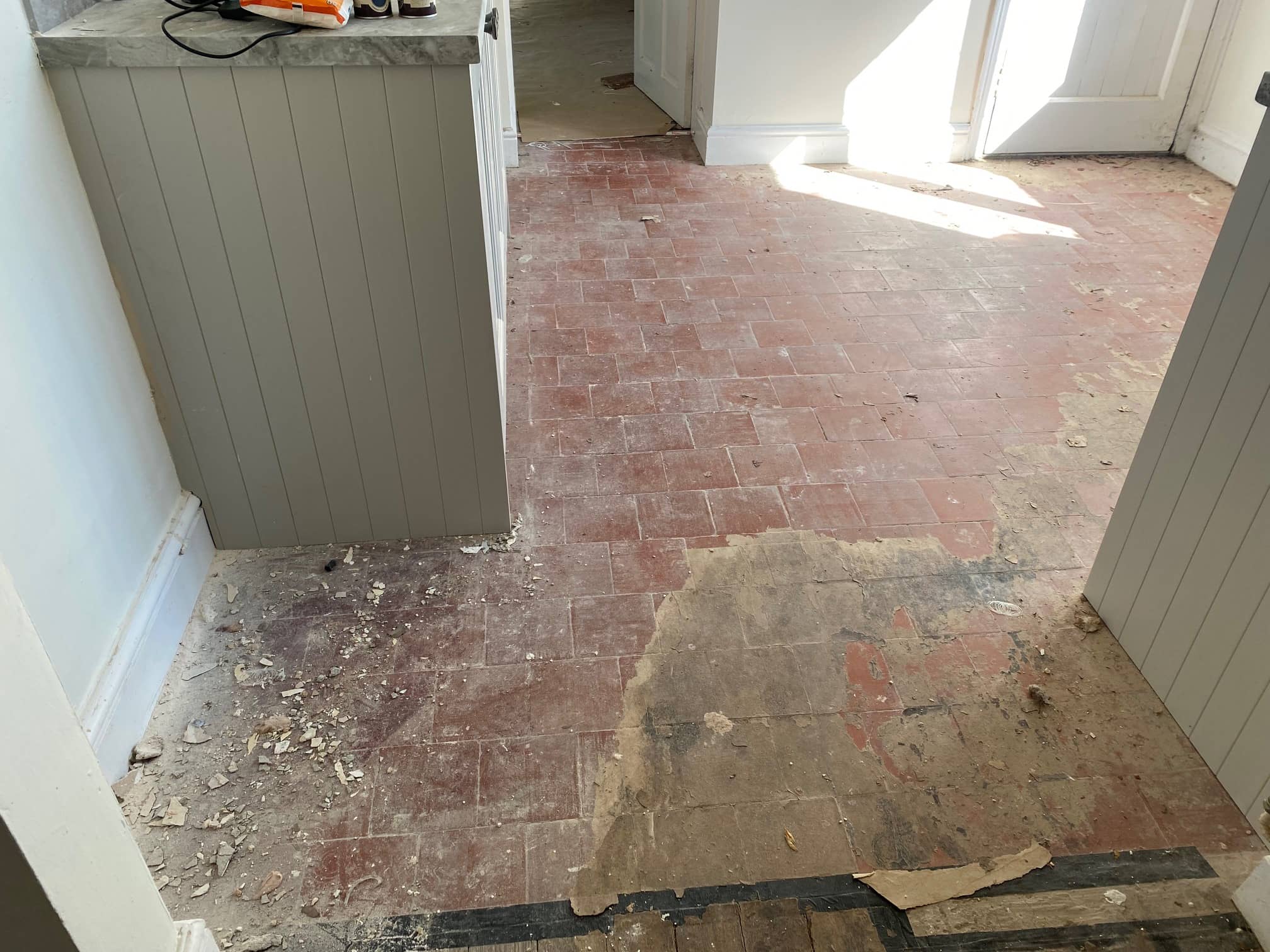 Old Victorian Period Red 6 inch floor tiles before cleaning in Windermere