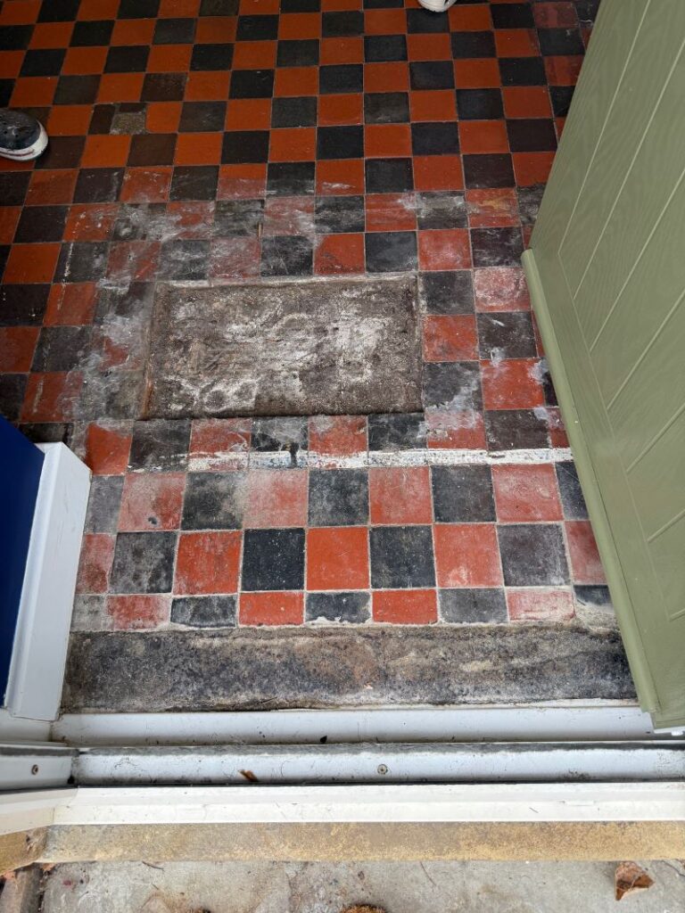 Red and Black Dorchester Pattern Quarry Tiled Floor During Repair in Kendal